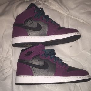 Tri colored high tip Nike’s sneakers